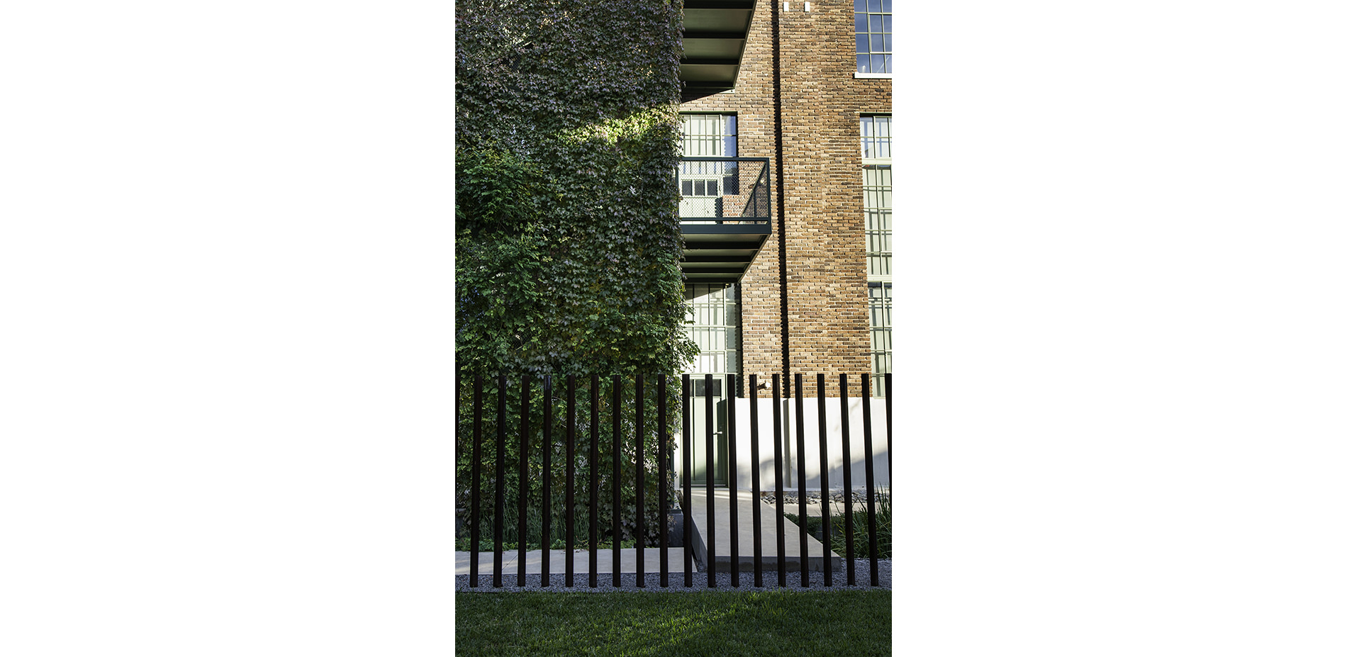 Green Screen at Stair Tower and Steel Picket Fence