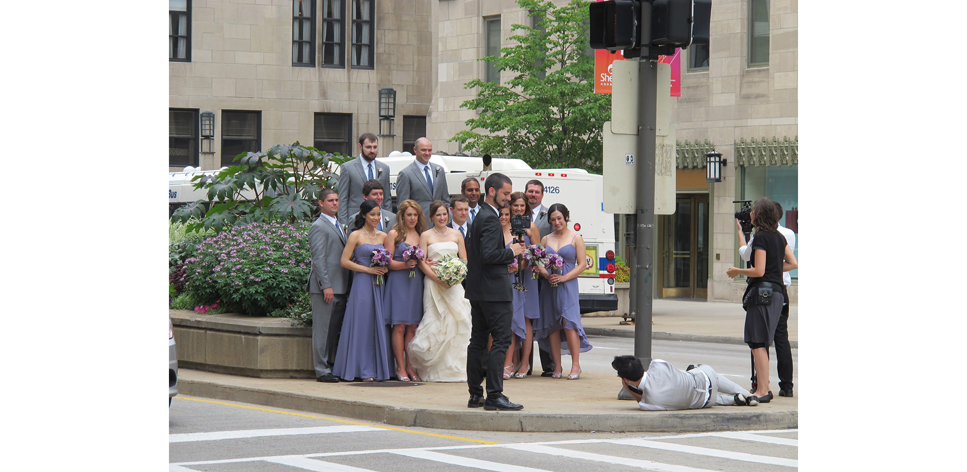 Various People Taking Photos Near Planters on Michigan Avenue