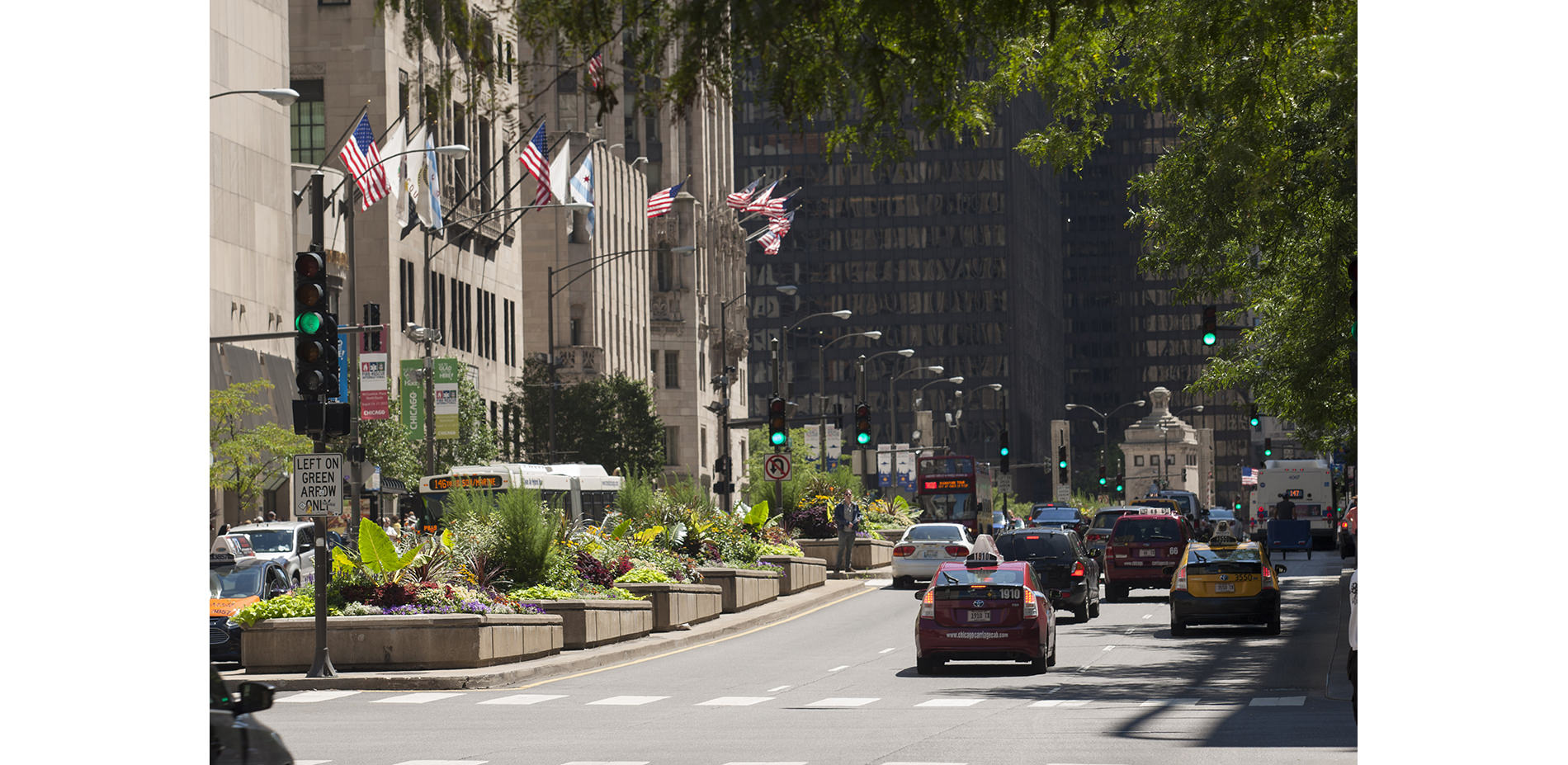 Cars on Michigan Avenue Next to Planters