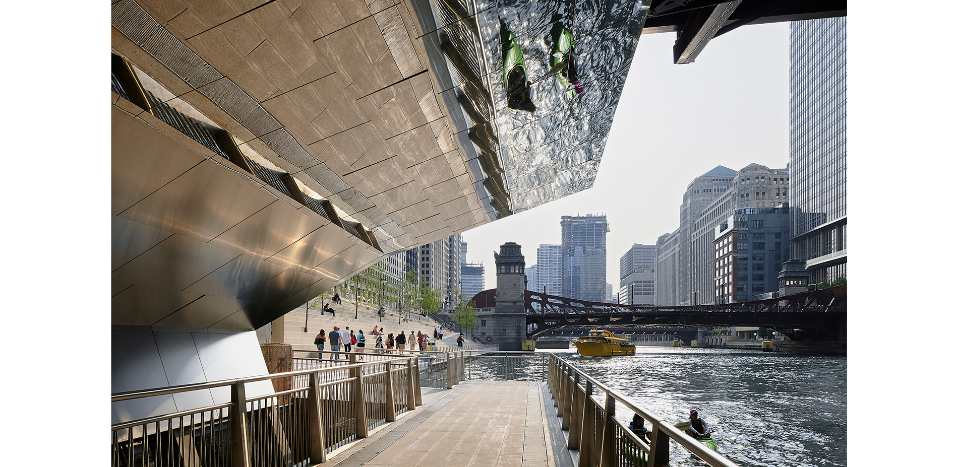 A series of “underbridge” crossings connect blocks that previously had been discrete spaces. These stainless-steel-canopied mini-bridges both shelter …