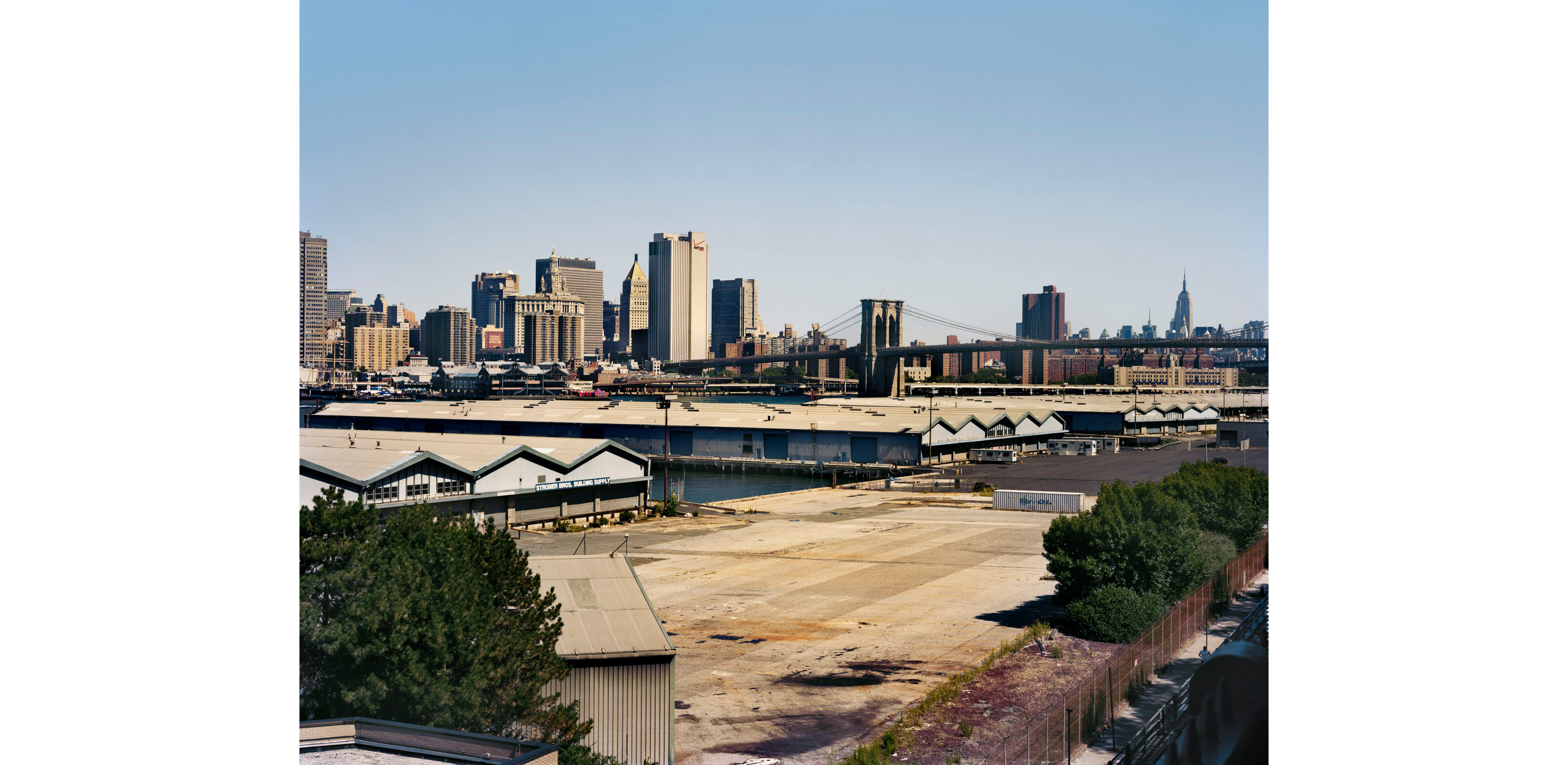 The enclosed 5-acre piers extend over the East River, while the paved upland is on solid ground, resulting in a composition of lightweight uses on out…