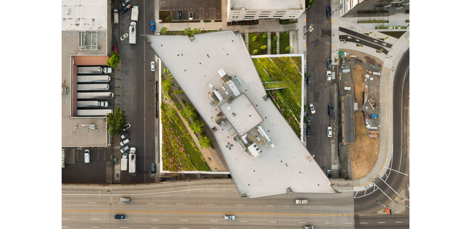 Aerial view showing the two interconnected sides of the green roof.…