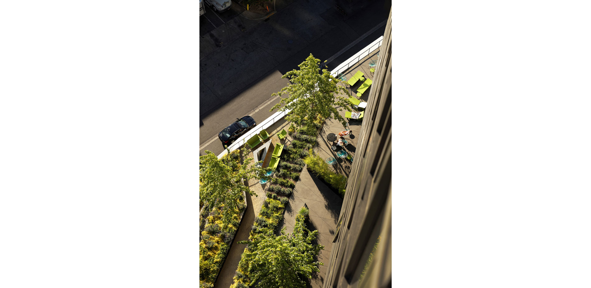 The roof garden creates a variety of intimate social spaces for residents and retail space visitors.  …