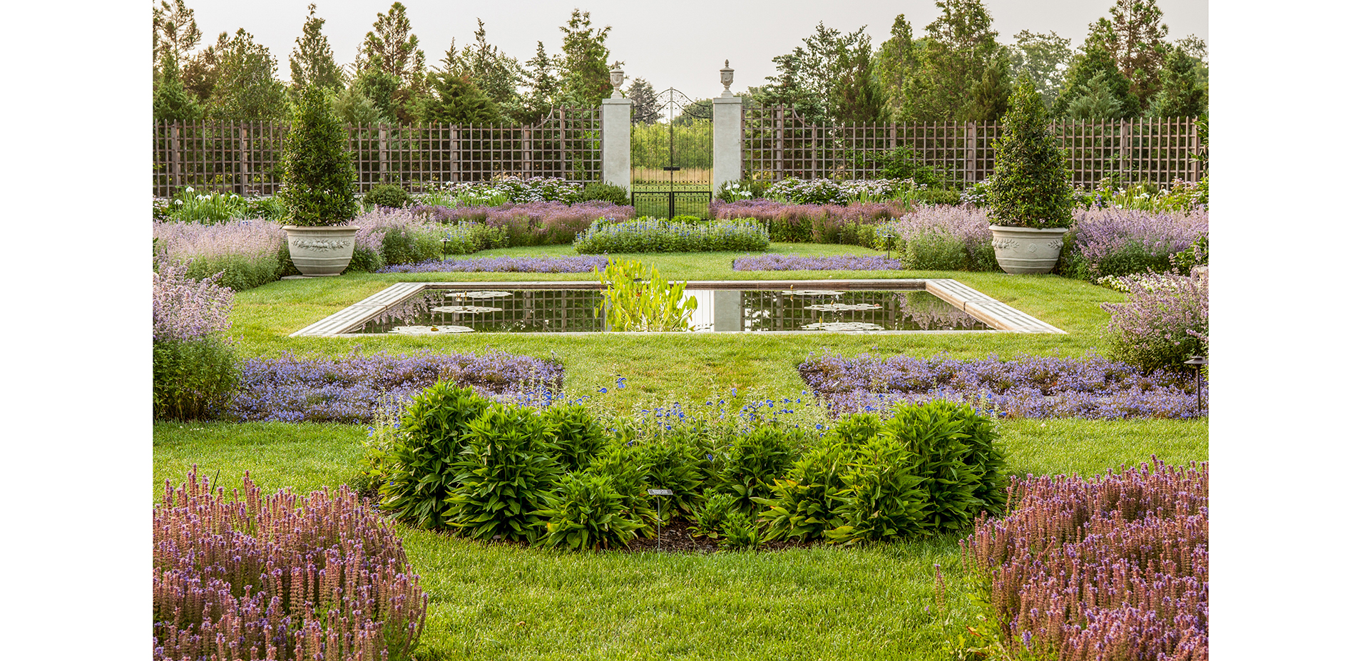 Looking across the axis to the east gate, framing a view of the adjacent meadow.…