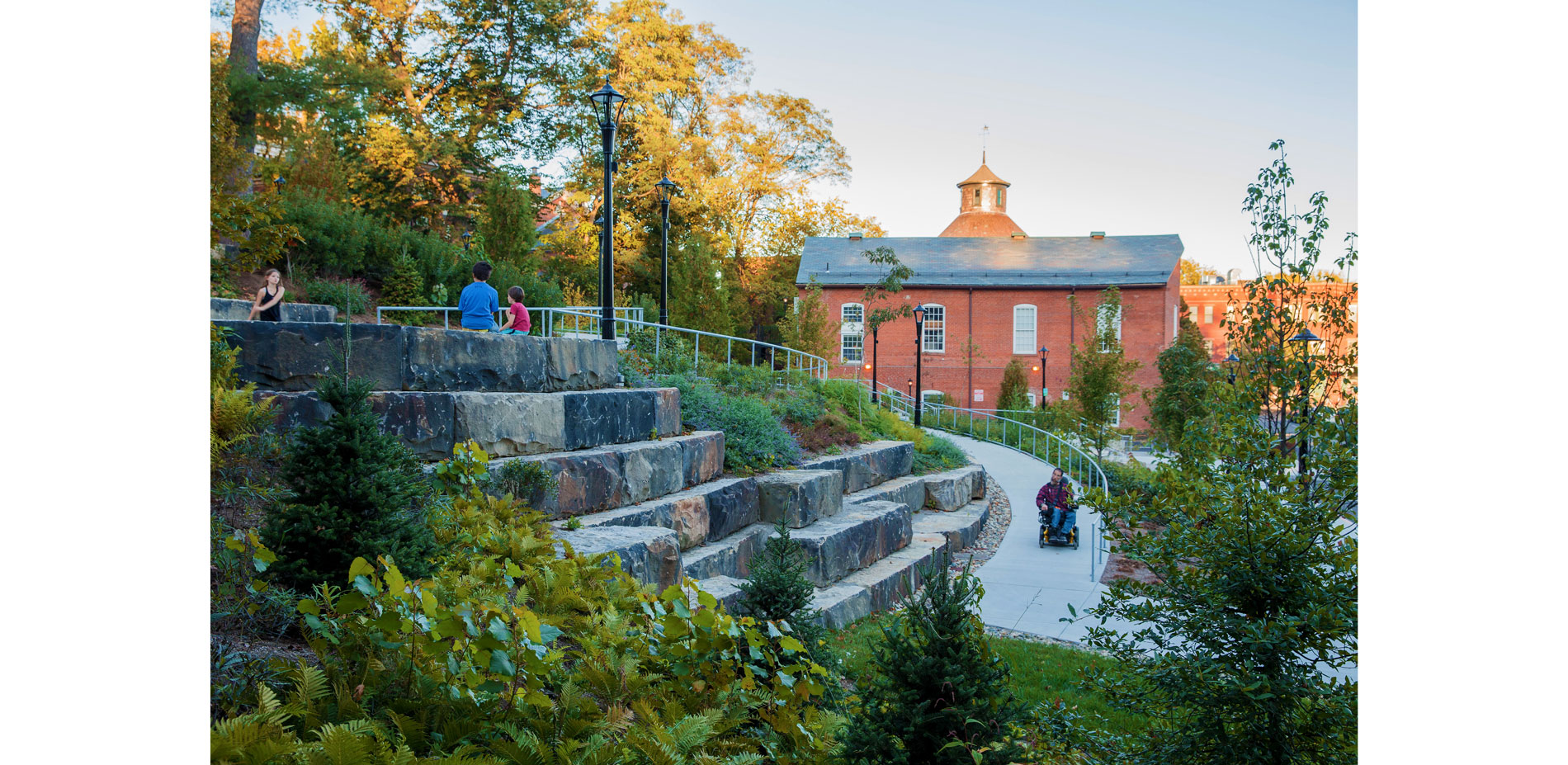 A new accessible walk at the Overlook is a direct link from the lower City up to Main Street. Salvaged stone from the City retains steep slopes and cr…