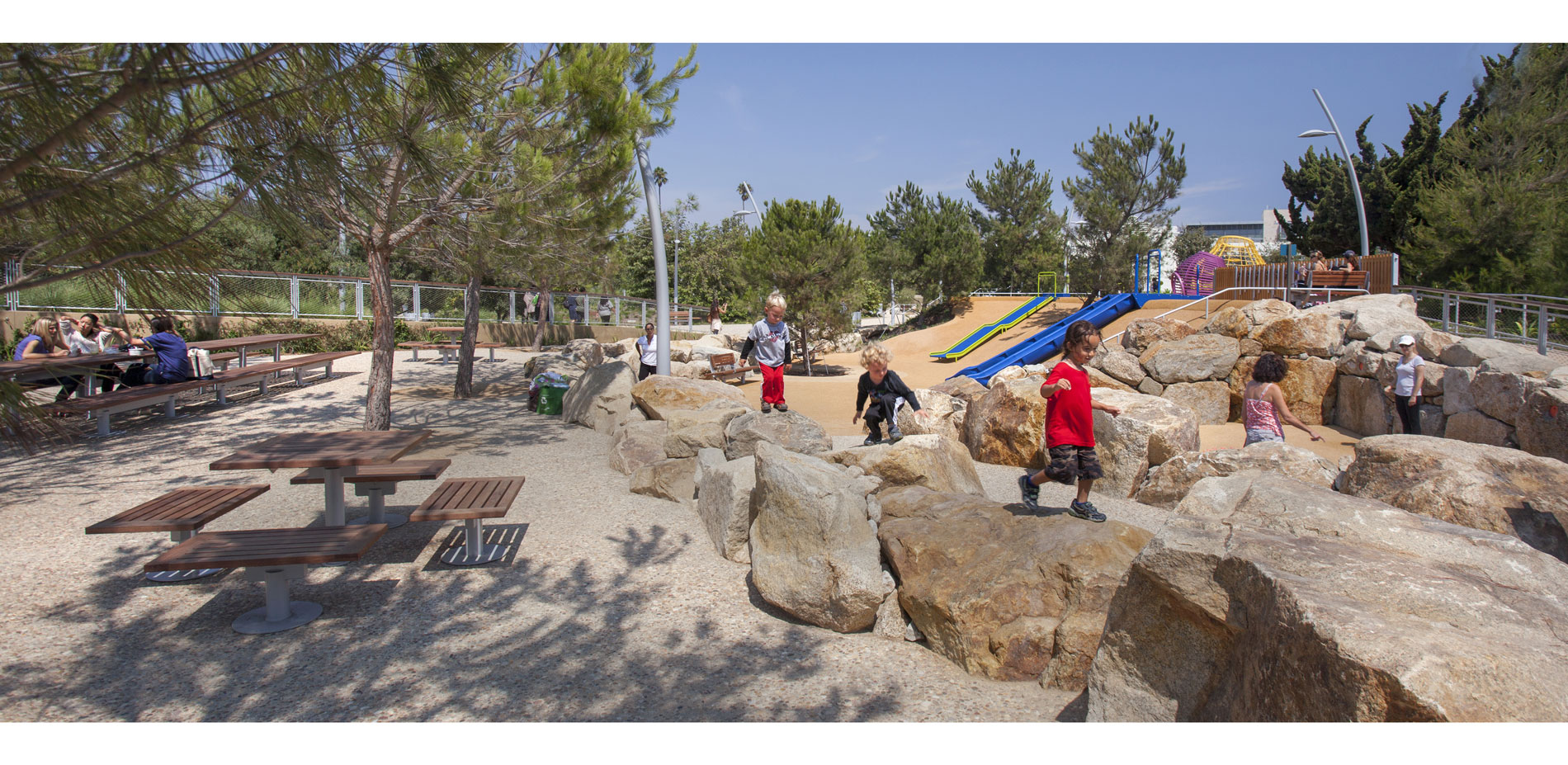 Discovery Hill is popular with children of all ages and abilities, with vibrant colors that pop against the backdrop of sand-colored surfacing and bou…