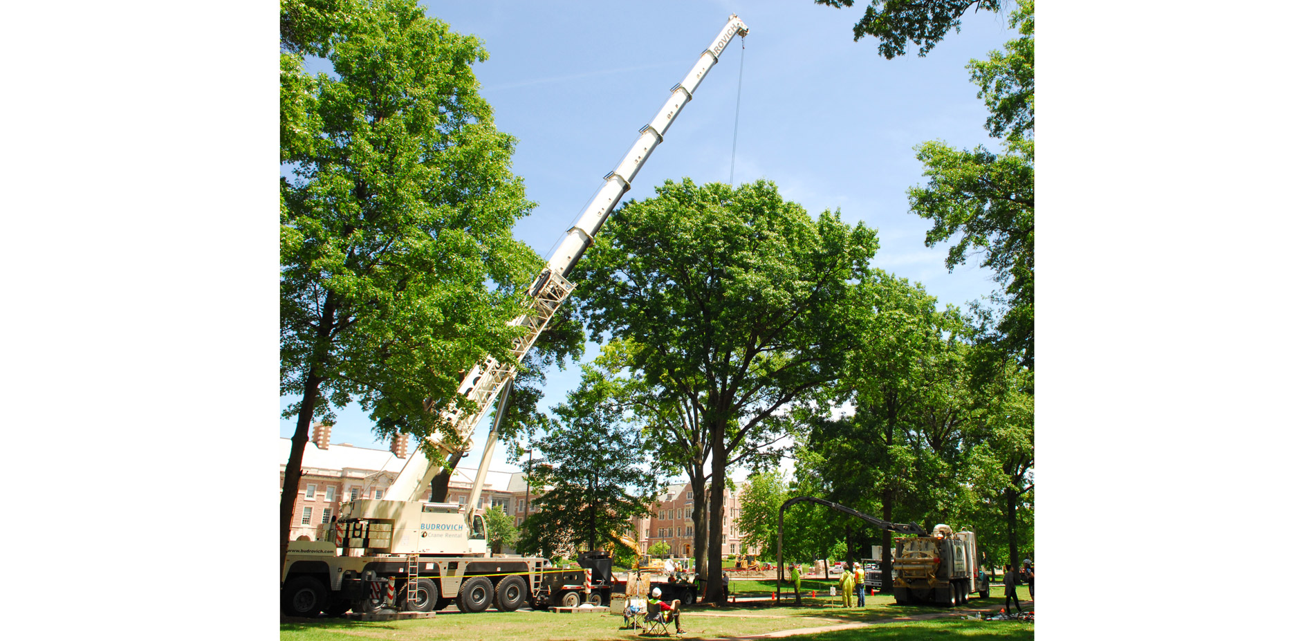 On the day after commencement, the community was invited to a ritual tree-felling centered around the One Tree. An 85-ton crane was connected to the t…