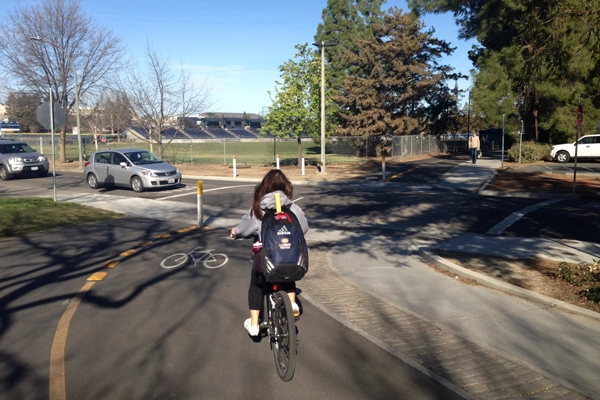 Mid-block road crossing design for bikes and pedestrians image: Skip Mezger