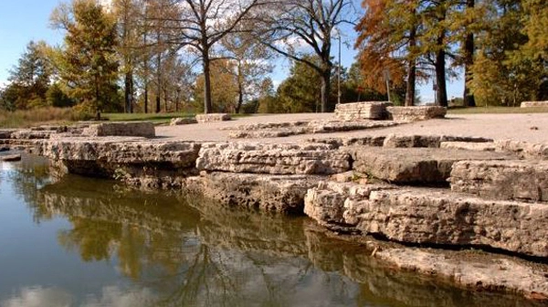 Slab/Stones Creating a Natural Border Along Edge of Pond image: Chris Miracle