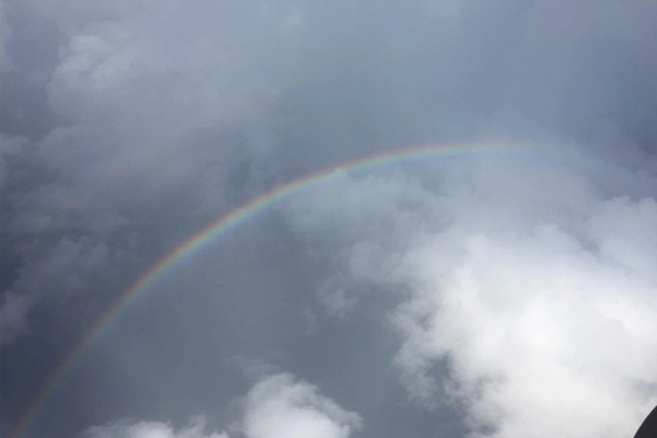 A rainbow from above image: Lisa Bailey