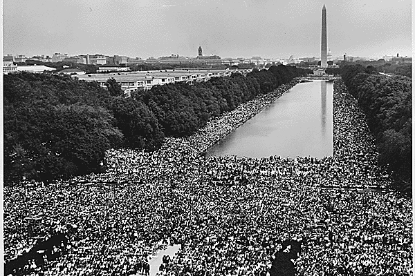 Civil Rights March on Washington, D.C. [A wide-angle view of marchers along the mall, showing the Reflecting Pool and the Washington Monument.], 08/28/1963 image: The U.S. National Archives via Flickr