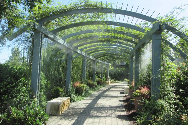 Arbor provides dappled shade and mist in summer image: Lisa Horne