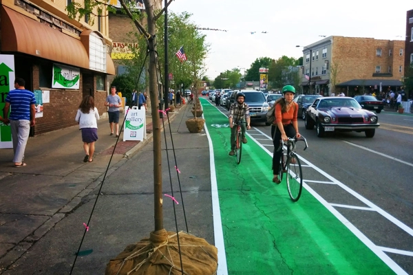 A temporary bike lane with street trees installed in Akron's first Better Block image: Jason Roberts