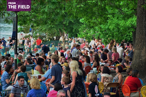 Part of the crowd at the Memorial Union on the campus of the University of Wisconsin-Madison, on graduation weekend, 2012 image: Richard Hurd via Flickr
