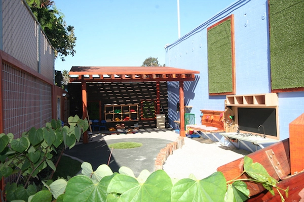 After. View Looking North at the shade structure. The new trellis structure lets in dappled sun as well as airflow, creating a much more comfortable outdoor classroom space than the previous shade tent. image: Ty Sterns