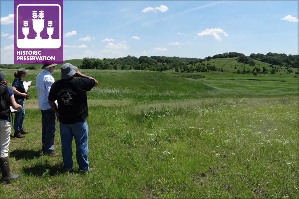 Randy Teboe, Tribal Historic Preservation Officer (THPO) of the Ponca Tribe of Iowa, on site at Xe’ (Blood Run National Historic Landmark, for which Quinn Evans Architects' cultural landscape master plan won a 2018 ASLA Professional Honor Award in Analysis and Planning) with Dale Henning, archeologist, and project landscape architects Stephanie Austin, ASLA, and Brenda Williams, ASLA. / image: Dan Williams, ASLA