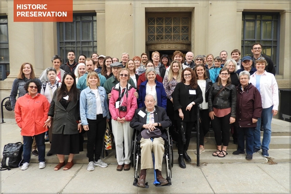 Conference attendees in front of the Detroit Public Library