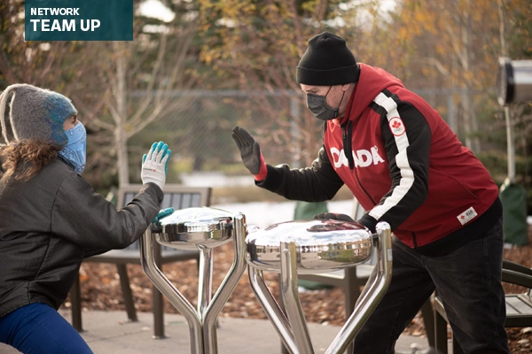 Park visitors using musical instruments