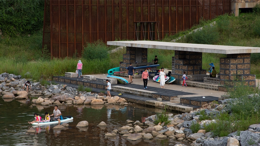 Embracing rural life, the waterside pavilion serves as a vibrant hub for daily interactions, seasonal festivities, and intergenerational gatherings.