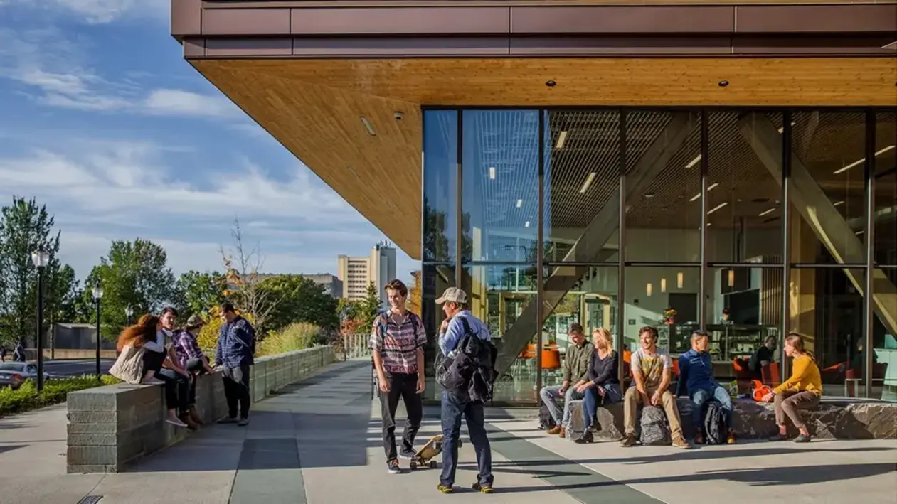 Students interacting on campus at UMass